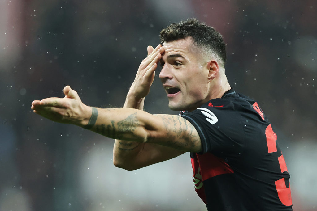Granit Xhaka confirms plan to attend Arsenal game for farewell 2 LEVERKUSEN, GERMANY - DECEMBER 03: Granit Xhaka of Bayer Leverkusen reacts during the Bundesliga match between Bayer 04 Leverkusen and Borussia Dortmund at BayArena on December 03, 2023 in Leverkusen, Germany. (Photo by Christof Koepsel/Getty Images)