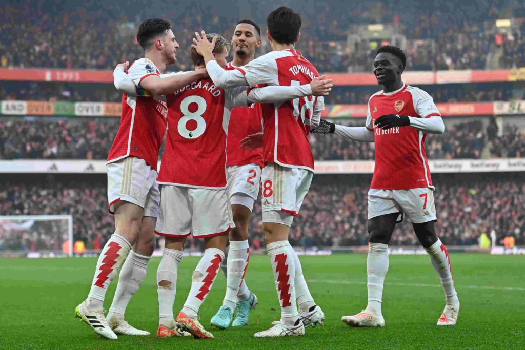 Key points from the Premier League's new TV deal 3 Arsenal's Norwegian midfielder #08 Martin Odegaard (2L) celebrates scoring the team's second goal during the English Premier League football match between Arsenal and Wolverhampton Wanderers at the Emirates Stadium in London on December 2, 2023. (Photo by GLYN KIRK/AFP via Getty Images)