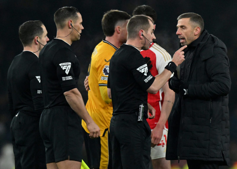 Wolverhampton Wanderers' English head coach Gary O'Neil (R) confronts Referee Peter Bankes after the English Premier League football match between ...