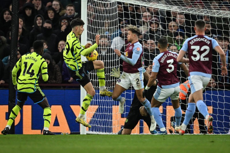 Mike Dean suggests potential rule change after Arsenal's disallowed goal 2 Arsenal's German midfielder #29 Kai Havertz (2nd L) and Aston Villa's English defender #02 Matty Cash (C-R) fight for the ball in front of the goal during the English Premier League football match between Aston Villa and Arsenal at Villa Park in Birmingham, central England on December 9, 2023. (Photo by JUSTIN TALLIS/AFP via Getty Images)