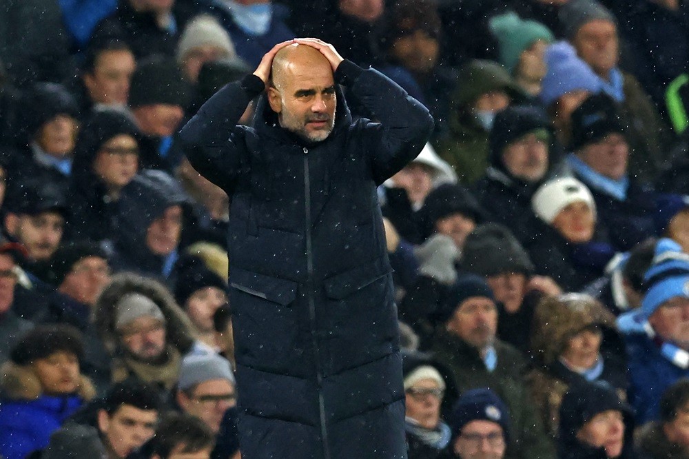 Manchester City's Spanish manager Pep Guardiola gestures on the touchline during the English Premier League football match between Manchester City ...