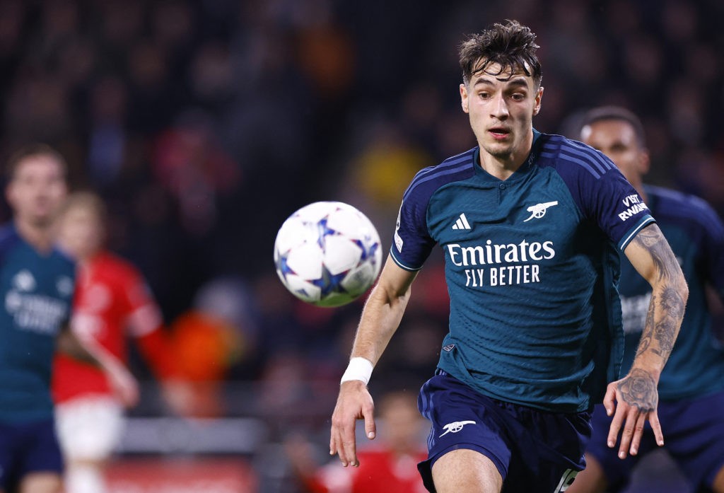 Arsenal's Polish defender #15 Jakub Kiwior eyes the ball during a UEFA Champions League group B football match between PSV Eindhoven and Arsenal FC at the Philips Stadium in Eindhoven, on December 12, 2023. (Photo by KENZO TRIBOUILLARD/AFP via Getty Images)