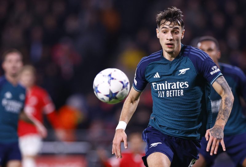 Arsenal's Polish defender #15 Jakub Kiwior eyes the ball during a UEFA Champions League group B football match between PSV Eindhoven and Arsenal FC...