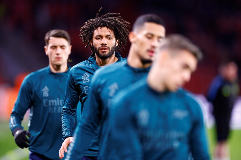 Early AFCON shocks could be bad news for Arsenal 3 Arsenal's Egyptian midfielder #25 Mohamed Elneny and team mates warm up prior to a UEFA Champions League group B football match between PSV Eindhoven and Arsenal FC at the Philips Stadium in Eindhoven, on December 12, 2023. (Photo by KENZO TRIBOUILLARD/AFP via Getty Images)