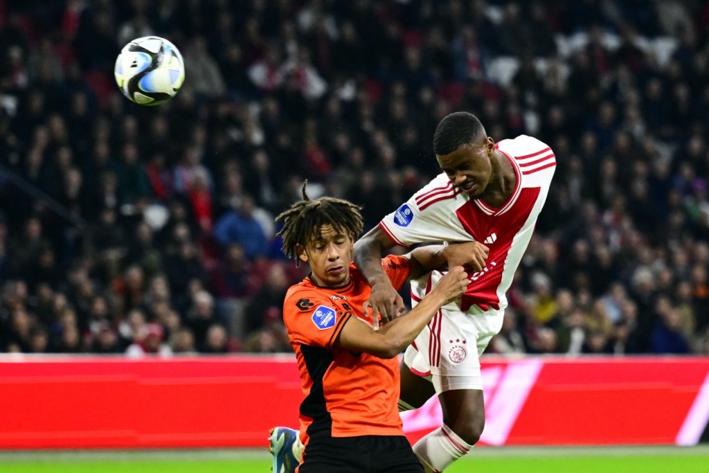 Ajax star remains Arsenal's top summer target in his position 4 FC Volendam's Dutch defender #26 Deron Payne (L) fights for the ball with Ajax's Dutch defender #04 Jorrel Hato during the Dutch Eredivisie match between Ajax Amsterdam and FC Volendam at The Johan Cruijff ArenA in Amsterdam on November 2, 2023. (Photo by OLAF KRAAK/ANP/AFP via Getty Images)