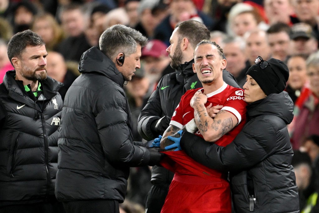 Liverpool 27yo's Instagram post highlights absurd fan abuse 3 LIVERPOOL, ENGLAND - DECEMBER 23: Kostas Tsimikas of Liverpool receives medical treatment during the Premier League match between Liverpool FC and Arsenal FC at Anfield on December 23, 2023 in Liverpool, England. (Photo by Michael Regan/Getty Images)