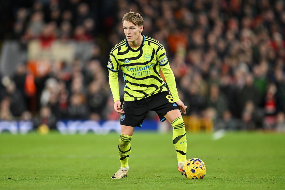 LIVERPOOL, ENGLAND: Martin Odegaard of Arsenal on the ball during the Premier League match between Liverpool FC and Arsenal FC at Anfield on December 23, 2023. (Photo by Michael Regan/Getty Images)