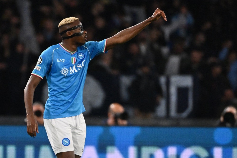 Napoli's Victor Osimhen celebrates after scoring the team's second goal during the UEFA Champions League Group C football match Napoli vs Sporting ...