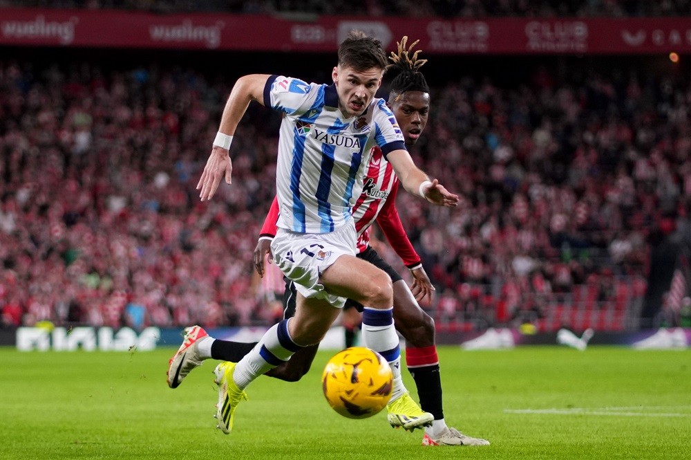 BILBAO, SPAIN: Kieran Tierney of Real Sociedad is challenged by Nico Williams of Athletic Club during the LaLiga EA Sports match at Estadio de San ...