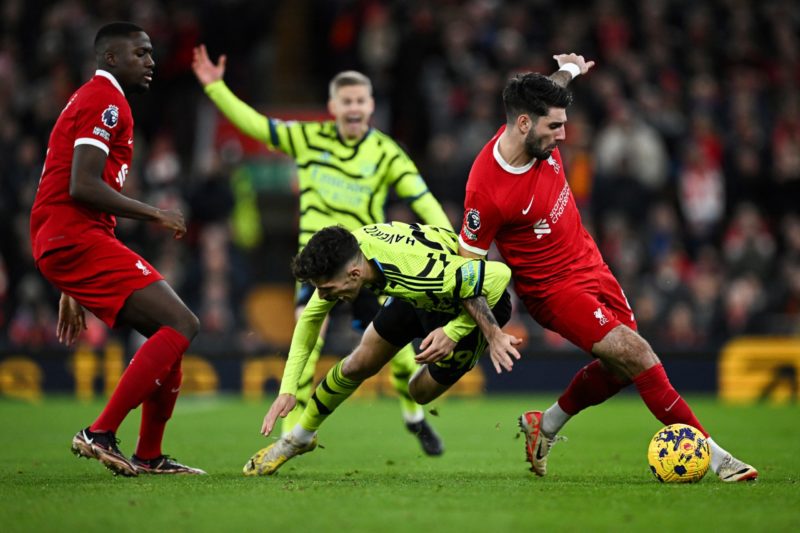 Boost as Liverpool midfielder ruled out of Arsenal FA Cup clash 3 Arsenal's German midfielder #29 Kai Havertz (L) is tackled by Liverpool's Hungarian midfielder #08 Dominik Szoboszlai (R) as they fight for the ball during the English Premier League football match between Liverpool and Arsenal at Anfield in Liverpool, north west England on December 23, 2023. (Photo by PAUL ELLIS/AFP via Getty Images)