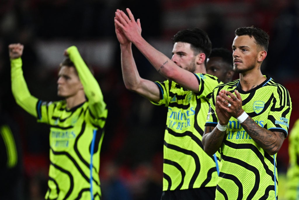 Arsenal's English midfielder #41 Declan Rice (C) and Arsenal's English defender #04 Ben White celebrate at the end of the English Premier League football match between Nottingham Forest and Arsenal at The City Ground in Nottingham, central England, on January 30, 2024. Arsenal wins 2 - 1 against Nottingham Forest. (Photo by PAUL ELLIS/AFP via Getty Images)