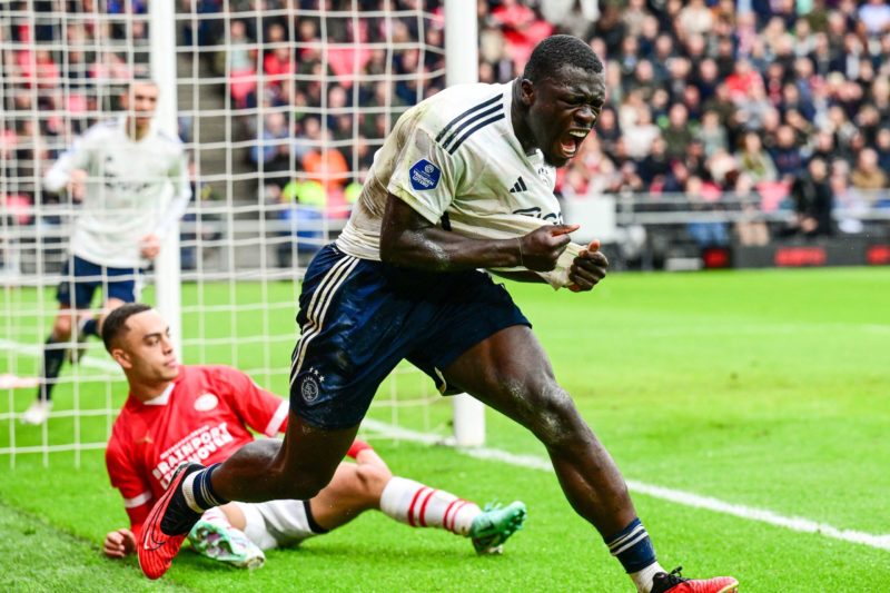 Ajax's Brian Brobbey celebrates after scoring a goal during the Dutch Eredivisie football match between PSV Eindhoven and Ajax Amsterdam at the Phillips stadium on October 29, 2023 in Eindhoven. Netherlands OUT (Photo by OLAF KRAAK/ANP/AFP via Getty Images)