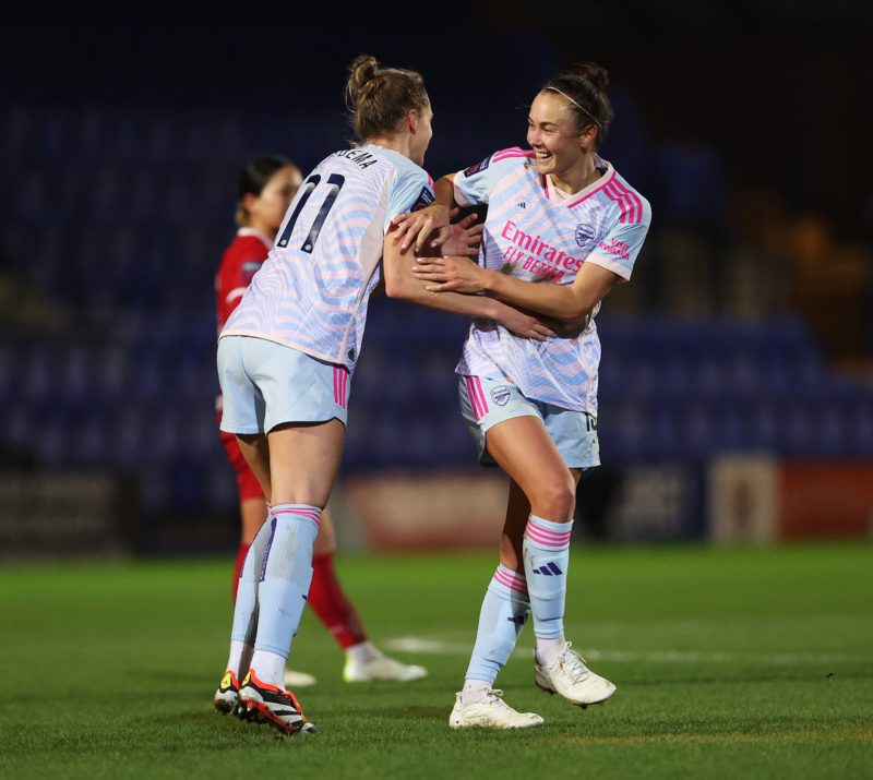 BIRKENHEAD, ENGLAND - JANUARY 28: Vivianne Miedema of Arsenal celebrates scoring her team's first goal with teammate Caitlin Foord during the Barcl...