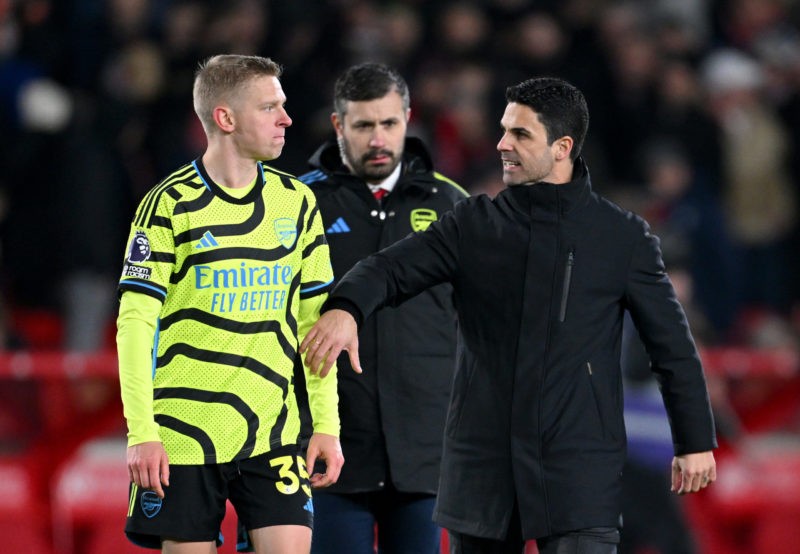 NOTTINGHAM, ENGLAND - JANUARY 30: Oleksandr Zinchenko of Arsenal and Mikel Arteta, Manager of Arsenal, interact after the team's victory in the Pre...