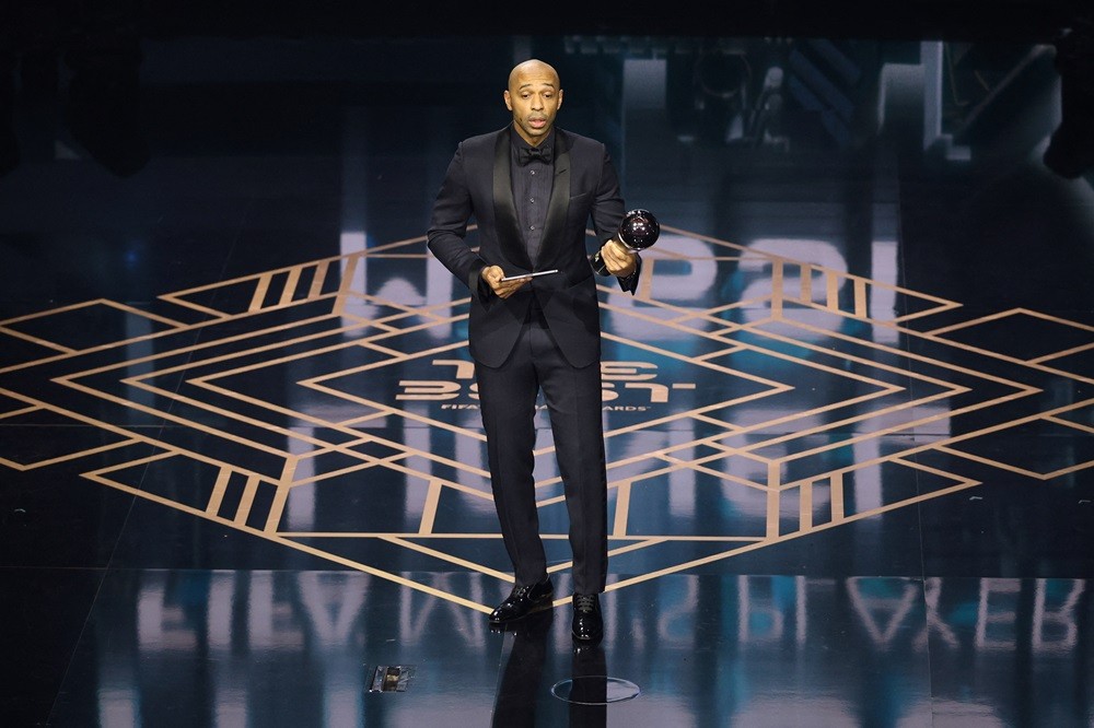 "I'm relaxed": Arsenal legends predict Porto 2nd-leg result 2 Thierry Henry reacts on stage after collecting The Best FIFA Men's Player award on behalf of Argentina and Inter Miami forward Lionel Messi during the Best FIFA Football Awards 2023 ceremony in London on January 15, 2024. (Photo by ADRIAN DENNIS/AFP via Getty Images)