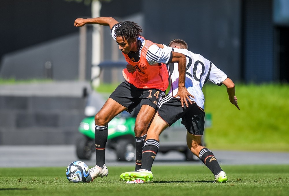 FRANKFURT AM MAIN, GERMANY: David Odogu and Robert Ramsak in action during a U18 German National Team practice session at DFB Campus on September 8, 2023. (Photo by Neil Baynes/Getty Images for DFB)
