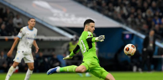 Ajax's German goalkeeper #40 Diant Ramaj kicks the ball during the UEFA Europa League Group B football match between Olympique de Marseille and Ajax Amsterdam at the Velodrome Stadium in Marseille, southeastern France, on November 30, 2023. (Photo by NICOLAS TUCAT/AFP via Getty Images)
