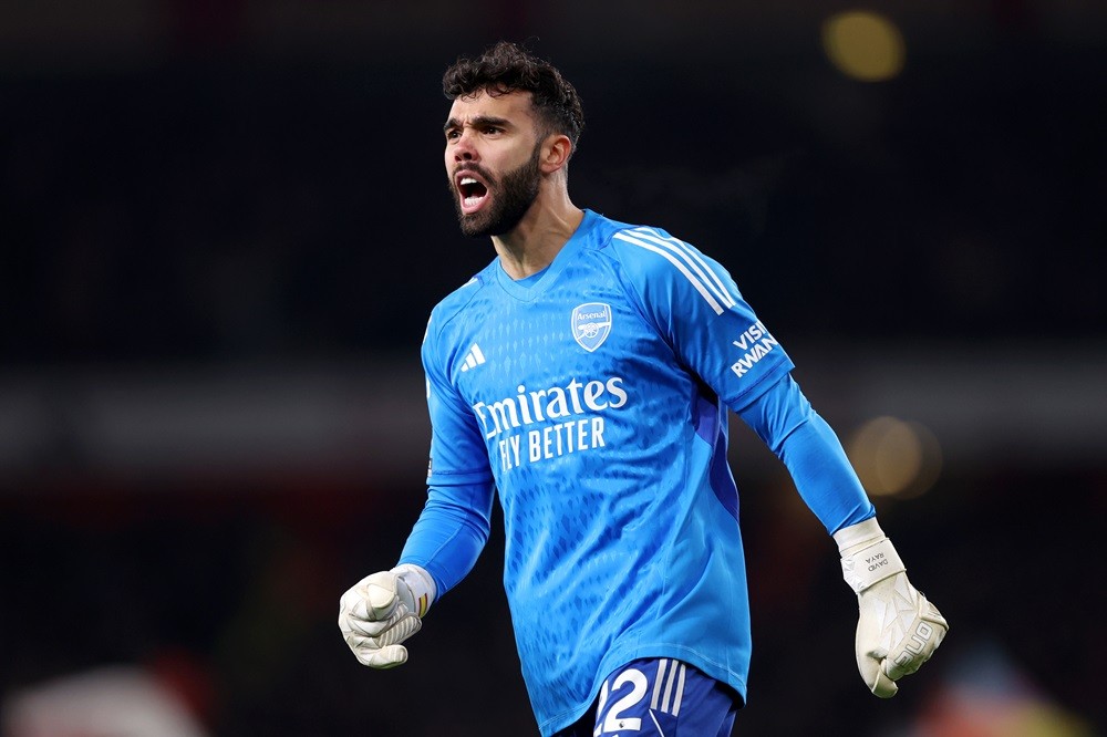 LONDON, ENGLAND: David Raya of Arsenal celebrates his team's first goal, an own-goal scored by Sven Botman of Newcastle United (not pictured), duri...