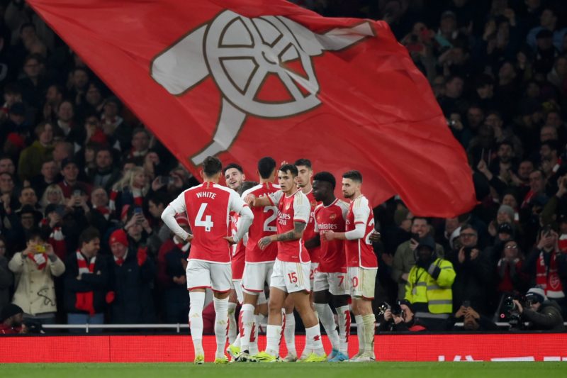 LONDON, ENGLAND - FEBRUARY 24: Bukayo Saka of Arsenal celebrates scoring his team's third goal with teammates during the Premier League match betwe...