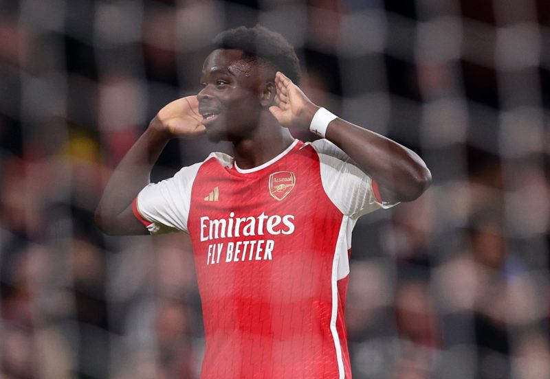 LONDON, ENGLAND - FEBRUARY 24: Bukayo Saka of Arsenal celebrates scoring his team's third goal during the Premier League match between Arsenal FC a...