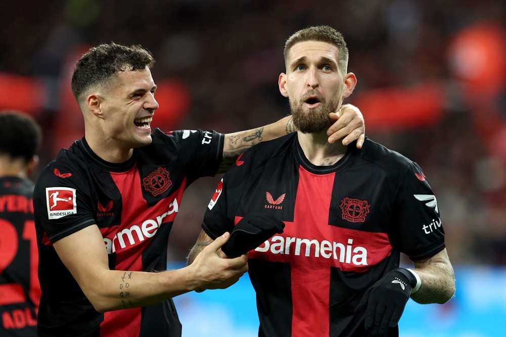 Arsenal fought to keep Granit Xhaka says Bayer Leverkusen sporting director 3 LEVERKUSEN, GERMANY: Robert Andrich of Bayer Leverkusen celebrates with Granit Xhaka of Bayer Leverkusen after scoring his team's second goal during the Bundesliga match between Bayer 04 Leverkusen and 1. FSV Mainz 05 at BayArena on February 23, 2024. (Photo by Alexander Hassenstein/Getty Images)