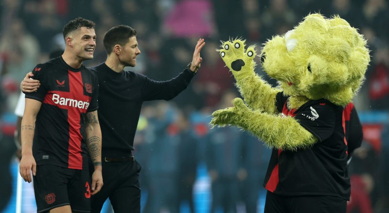 Arsenal fought to keep Granit Xhaka says Bayer Leverkusen sporting director 4 LEVERKUSEN, GERMANY - FEBRUARY 10: Xabi Alonso, Head Coach of Bayer Leverkusen, celebrates with Granit Xhaka of Bayer Leverkusen after winning the Bundesliga match between Bayer 04 Leverkusen and FC Bayern München at BayArena on February 10, 2024 in Leverkusen, Germany. (Photo by Lars Baron/Getty Images)