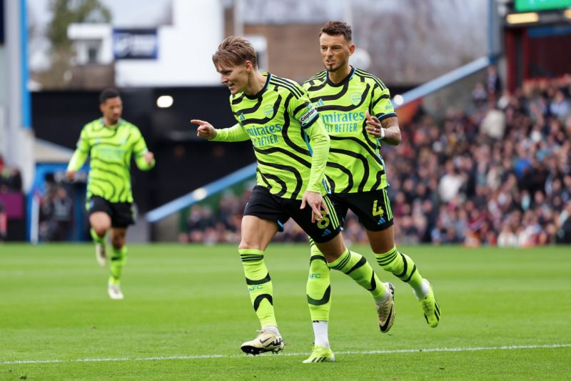 Behind Arsenal's scoring form: Arteta's shared goals vision 2 BURNLEY, ENGLAND - FEBRUARY 17: Martin Odegaard of Arsenal celebrates scoring his team's first goal during the Premier League match between Burnley FC and Arsenal FC at Turf Moor on February 17, 2024 in Burnley, England. (Photo by Matt McNulty/Getty Images)