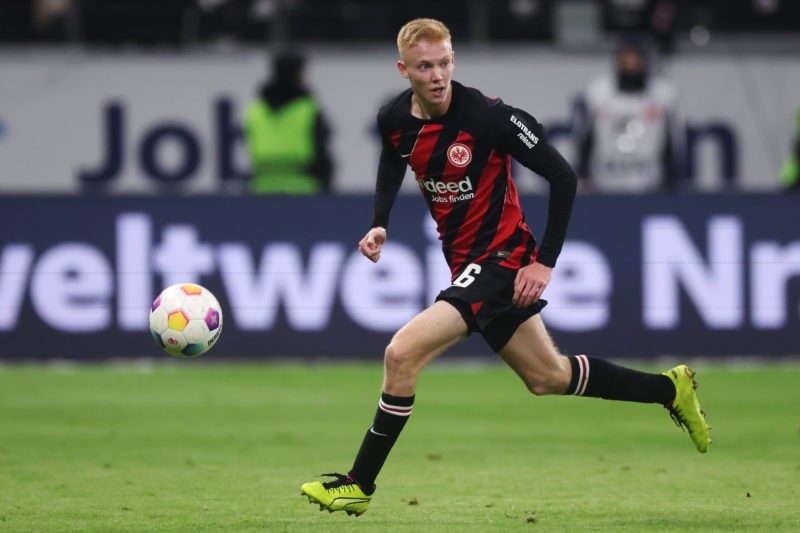 FRANKFURT AM MAIN, GERMANY - JANUARY 26: Hugo Larsson of Frankfurt controls the ball during the Bundesliga match between Eintracht Frankfurt and 1. FSV Mainz 05 at Deutsche Bank Park on January 26, 2024 in Frankfurt am Main, Germany. (Photo by Alex Grimm/Getty Images)