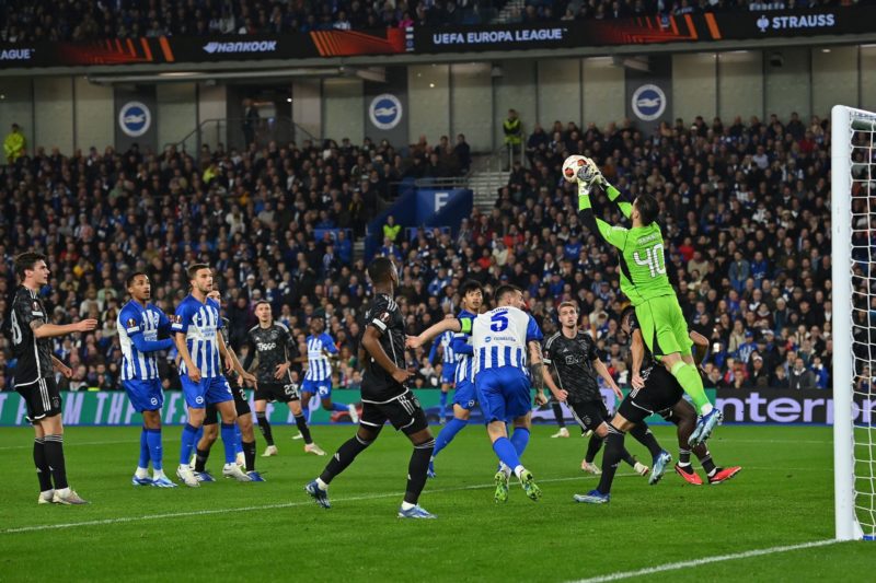 Arsenal eye 22yo Diant Ramaj as Aaron Ramsdale replacement 4 Ajax's German goalkeeper #40 Diant Ramaj jumps to make a save during the UEFA Europa League Group B football match between Brighton and Hove Albion and Ajax at the American Express Community Stadium in Brighton, southern England on October 26, 2023. Photo by GLYN KIRK/AFP via Getty Images)
