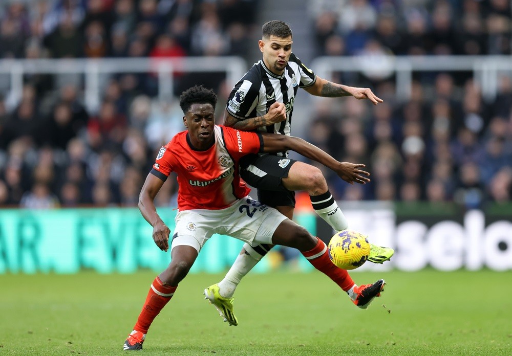 Arsenal player pictured arriving in Spain for medical 4 NEWCASTLE UPON TYNE, ENGLAND: Albert Sambi Lokonga of Luton Town clashes with Bruno Guimaraes of Newcastle United during the Premier League match between Newcastle United and Luton Town at St. James Park on February 03, 2024. (Photo by George Wood/Getty Images)