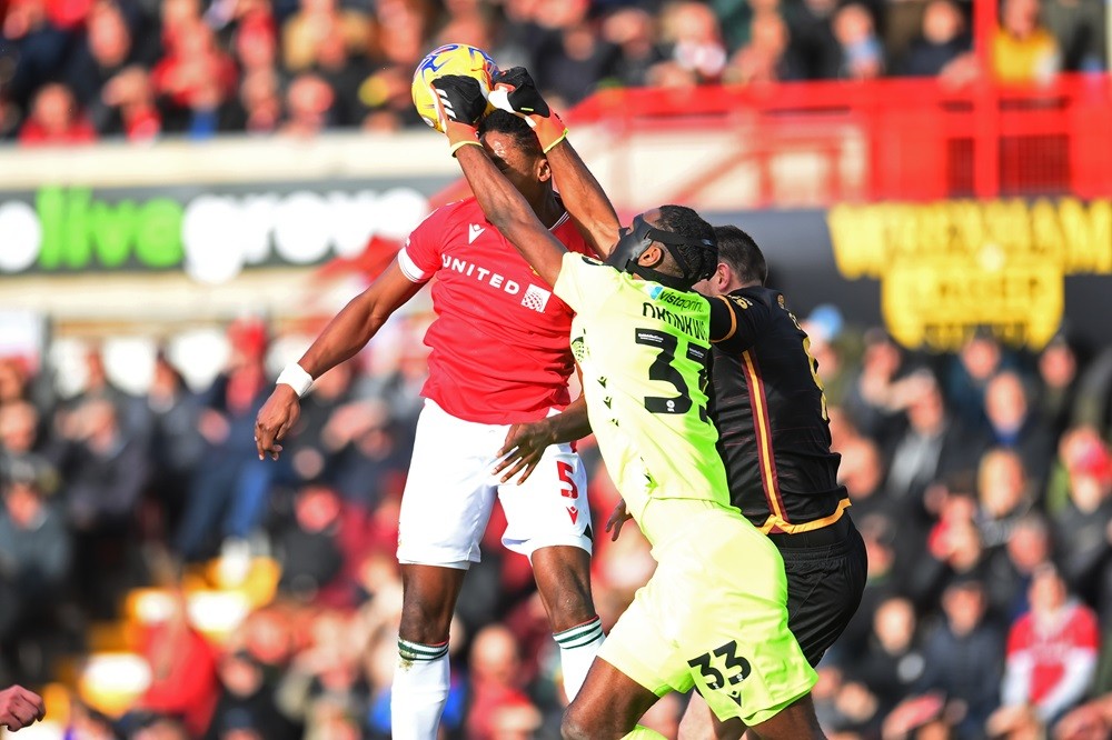 Arsenal loanee keeps 10th league clean sheet of the season 2 WREXHAM, WALES: Arthur Okonkwo of Wrexham comes out and punches the ball during the Sky Bet League Two match between Wrexham and Bradford City at Racecourse Ground on February 10, 2024. (Photo by Ben Roberts Photo/Getty Images)