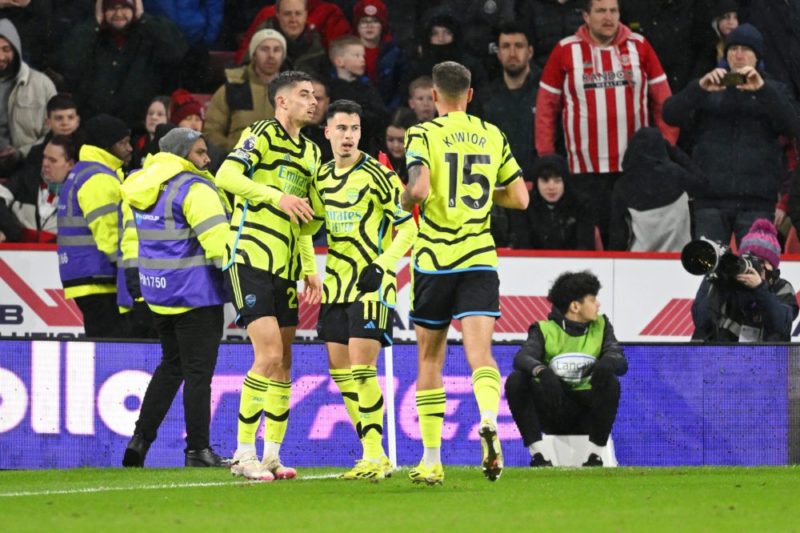 SHEFFIELD, ENGLAND: Gabriel Martinelli of Arsenal celebrates with teammate Kai Havertz and Jakub Kiwior of Arsenal after scoring his team's third g...