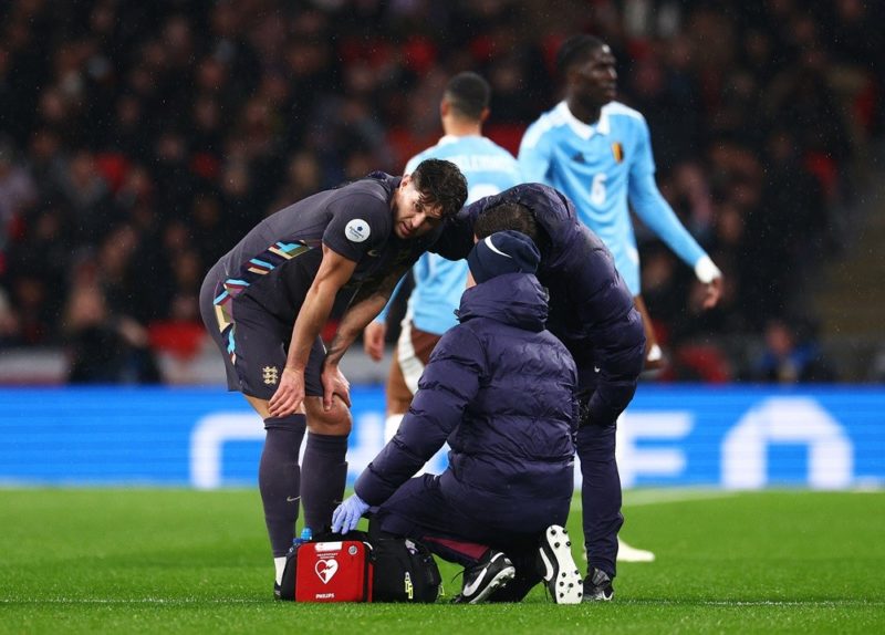 LONDON, ENGLAND: John Stones of England receives medical treatment during the international friendly match between England and Belgium at Wembley S...