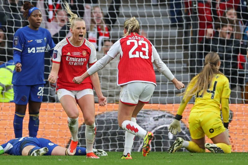 Arsenal's Swedish striker #25 Stina Blackstenius (2L) celebrates with Arsenal's English striker #23 Alessia Russo (C) after scoring the opening goa...