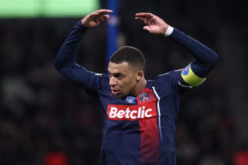 Kylian Mbappe hints at Real Madrid move, laughs off Arsenal 2 Paris Saint-Germain's French forward #07 Kylian Mbappe reacts during the French Cup (Coupe de France) quarter-final football match between Paris Saint-Germain (PSG) and OGC Nice at the Parc des Princes stadium, in Paris, on March 13, 2024. (Photo by FRANCK FIFE/AFP via Getty Images)