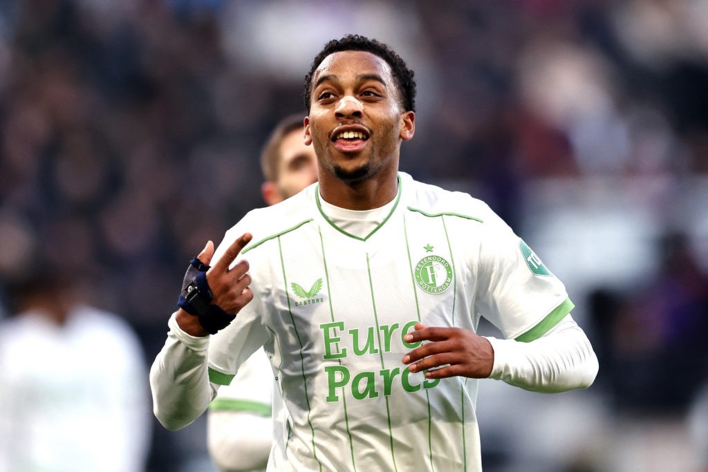 Feyenoord's Dutch midfielder #08 Quinten Timber celebrates after scoring Feyenoord's fourth goal during the Dutch Eredivisie football match between Heracles Almelo and Feyenoord at the Erve Asito stadium in Almelo on December 17, 2023. Netherlands OUT (Photo by VINCENT JANNINK/ANP/AFP via Getty Images)