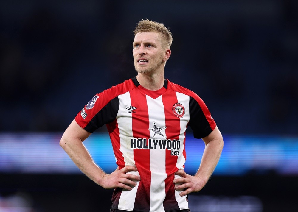 MANCHESTER, ENGLAND: Ben Mee of Brentford during the Premier League match between Manchester City and Brentford FC at Etihad Stadium on February 20...