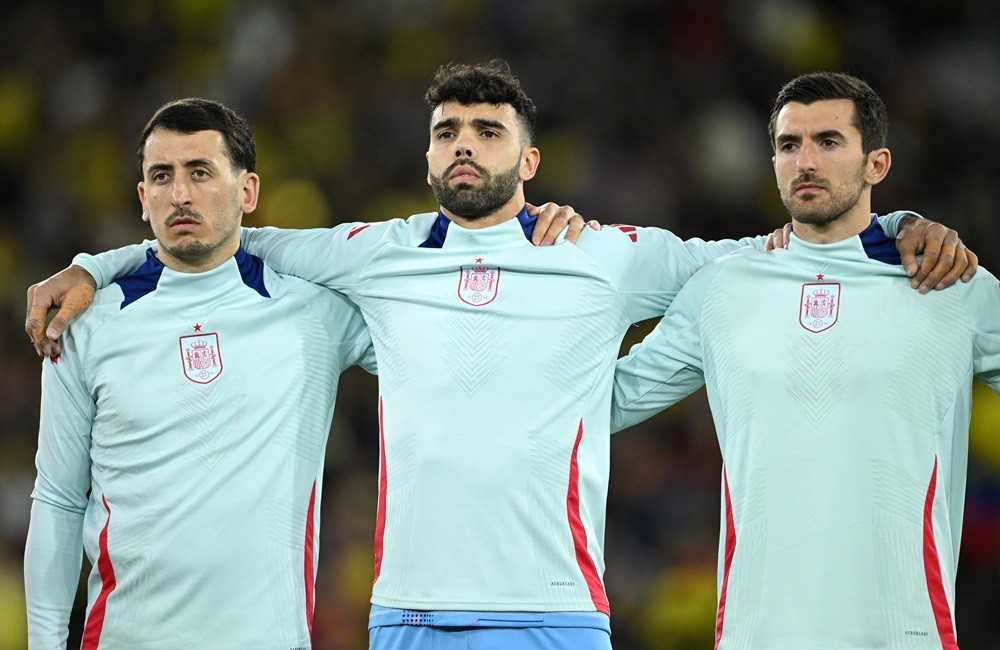 LONDON, ENGLAND: Mikel Oyarzabal, David Raya and Daniel Vivian of Spain line up for the international friendly match between Spain and Colombia at ...