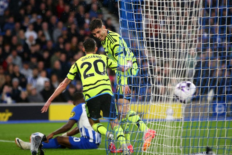 BRIGHTON, ENGLAND - APRIL 06: Kai Havertz of Arsenal celebrates scoring his team's second goal with teammate Jorginho during the Premier League match between Brighton & Hove Albion and Arsenal FC at American Express Community Stadium on April 06, 2024 in Brighton, England. (Photo by Steve Bardens/Getty Images)