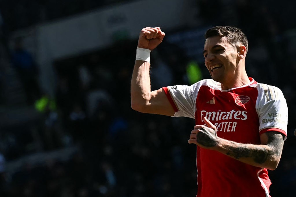 Arsenal's Polish defender #15 Jakub Kiwior celebrates at the end of during the English Premier League football match between Tottenham Hotspur and Arsenal at the Tottenham Hotspur Stadium in London, on April 28, 2024. Arsenal wins 3 - 2 against Tottenham Hotspur. (Photo by BEN STANSALL/AFP via Getty Images)