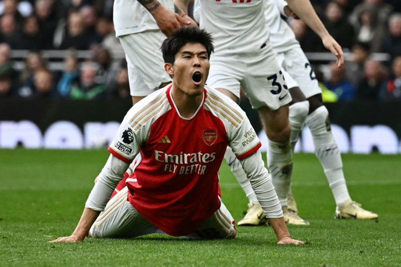 Arsenal's Japanese defender #18 Takehiro Tomiyasu reacts after missing to score during the English Premier League football match between Tottenham ...