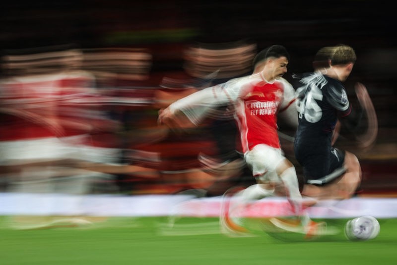 Fringe players shine as Arsenal maintain title charge 3 TOPSHOT - Arsenal's Brazilian midfielder #11 Gabriel Martinelli (L) fights for the ball with Luton Town's English midfielder #45 Alfie Doughty during the English Premier League football match between Arsenal and Luton Town at the Emirates Stadium in London on April 3, 2024. (Photo by ADRIAN DENNIS/AFP via Getty Images)