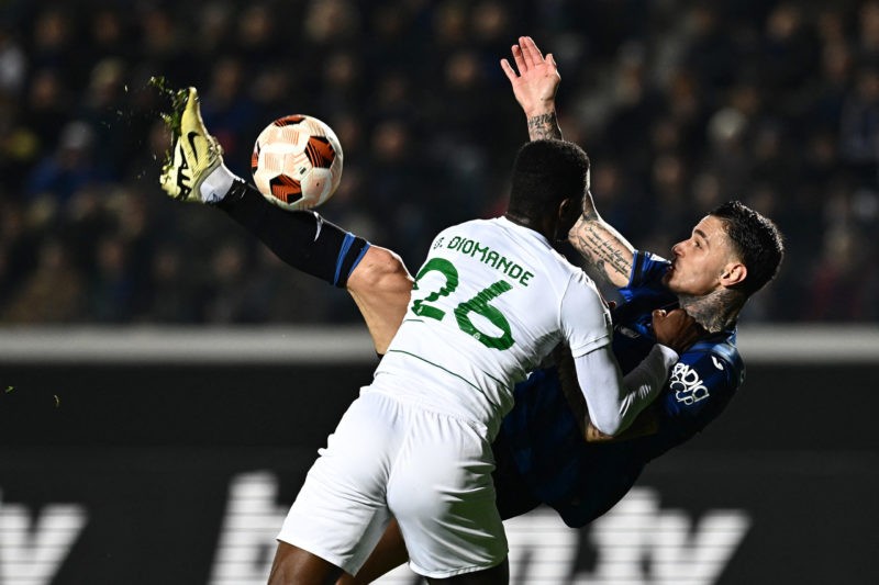 Arsenal emerge as frontrunners for Diomande's signature 2 TOPSHOT - Atalanta's Italian forward #90 Gianluca Scamacca (R) fights for the ball with Sporting Lisbon's Ivorian defender #26 Ousmane Diomande during the UEFA Europa League last 16 second leg football match between Atalanta and Sporting CP at the Atleti Azzurri d'Italia Stadium in Bergamo on March 14, 2024. (Photo by GABRIEL BOUYS/AFP via Getty Images)