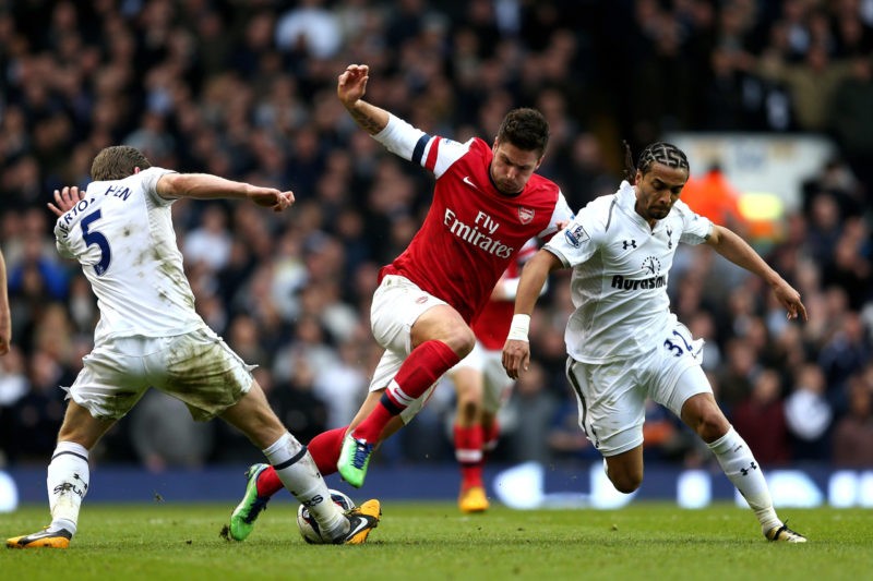 LONDON, ENGLAND - MARCH 03: Olivier Giroud of Arsenal is closed down by Jan Vertonghen (L) and Benoit Assou-Ekotto (R) of Spurs during the Barclays...