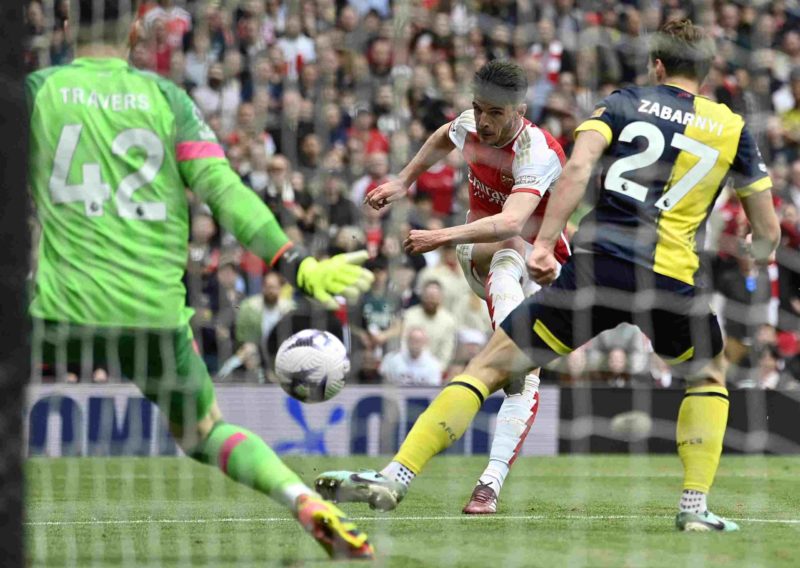 VAR fails Arsenal again: Saka left bloody after appalling challenge 6 Arsenal's English midfielder #41 Declan Rice scores the team's third goal during the English Premier League football match between Arsenal and Bournemouth at the Emirates Stadium, in London, on May 4, 2024. (Photo by JUSTIN TALLIS/AFP via Getty Images)