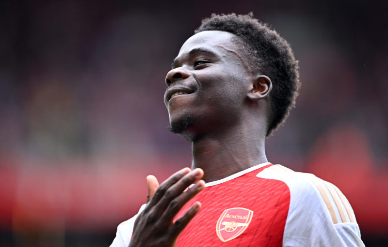 Arsenal's English midfielder #07 Bukayo Saka celebrates scoring the opening goal from the penalty spot during the English Premier League football m...