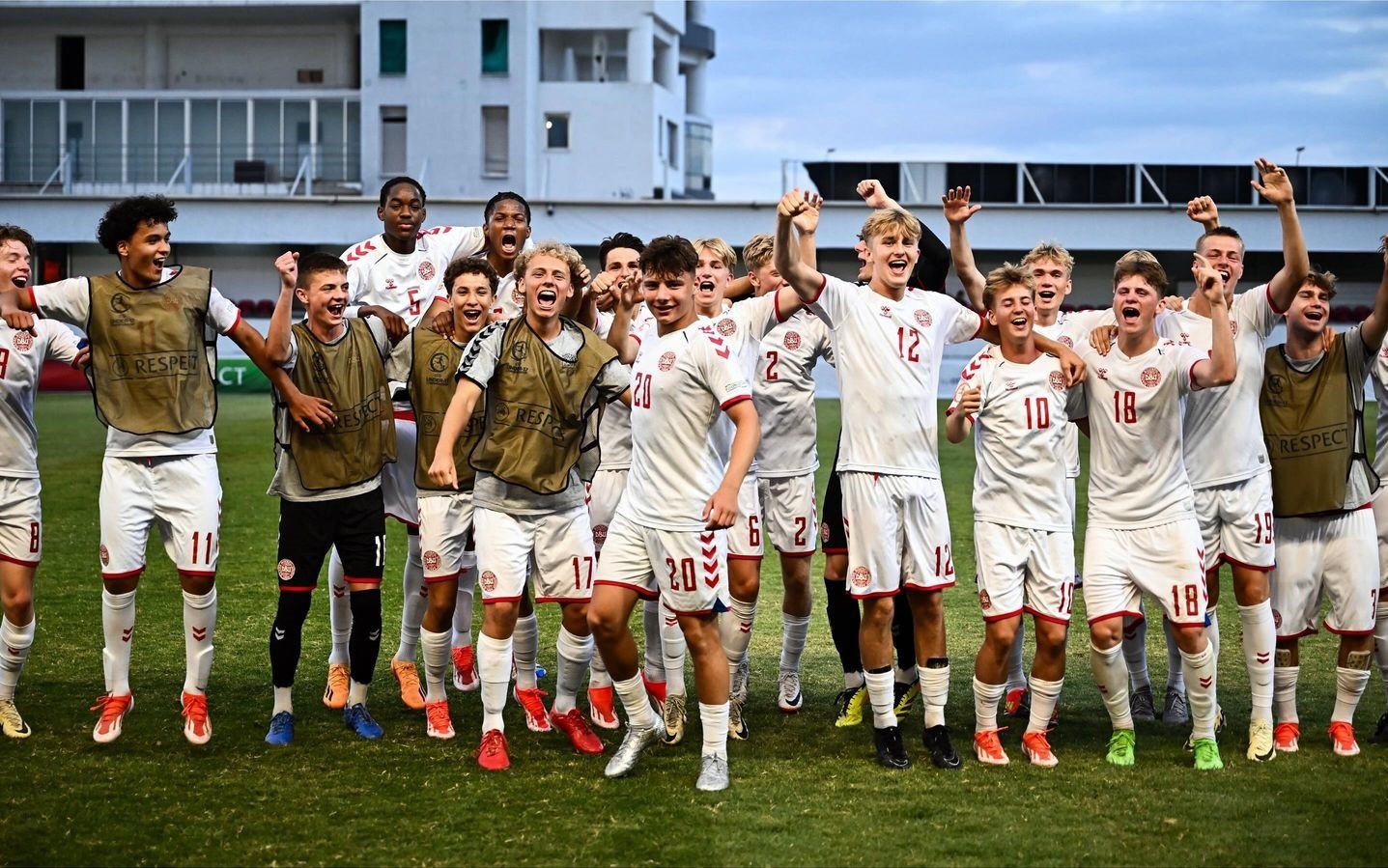 Chido Martin Obi (back row, second from left) celebrates a win with the Denmark u17s (Photo via DBU on Instagram)