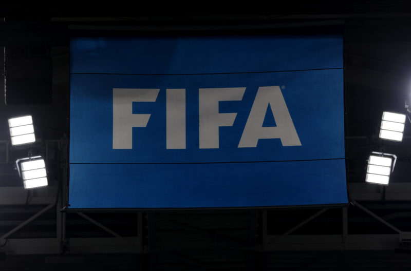 DOHA, QATAR - DECEMBER 01: View of the FIFA logo on a flag during the FIFA World Cup Qatar 2022 Group F match between Canada and Morocco at Al Thum...