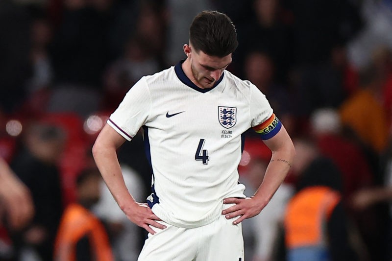 England's midfielder #04 Declan Rice reacts to their defeat on the pitch after the International friendly football match between England and Icelan...