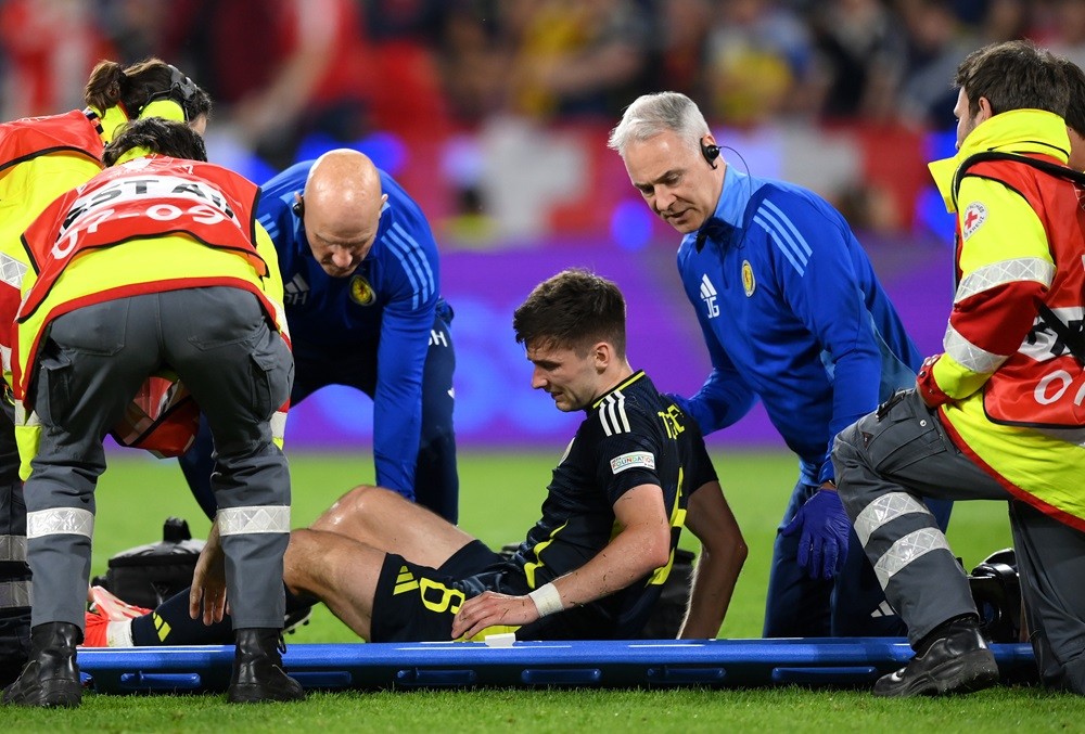 COLOGNE, GERMANY: Kieran Tierney of Scotland lies injured on a stretcher during the UEFA EURO 2024 group stage match between Scotland and Switzerland at Cologne Stadium on June 19, 2024. (Photo by Justin Setterfield/Getty Images)